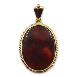  9ct gold mounted agate pendant, hallmarked  