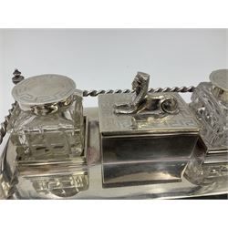Egyptian Revival style desk stand, with pen tray and two glass inkwells, upon four bracket feet, W23cm