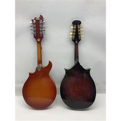 Eastern eight-string mandolin with sunburst finish and mother-of-pearl inlay L68.5cm; and another Harmony mandolin with cracked headstock (2)