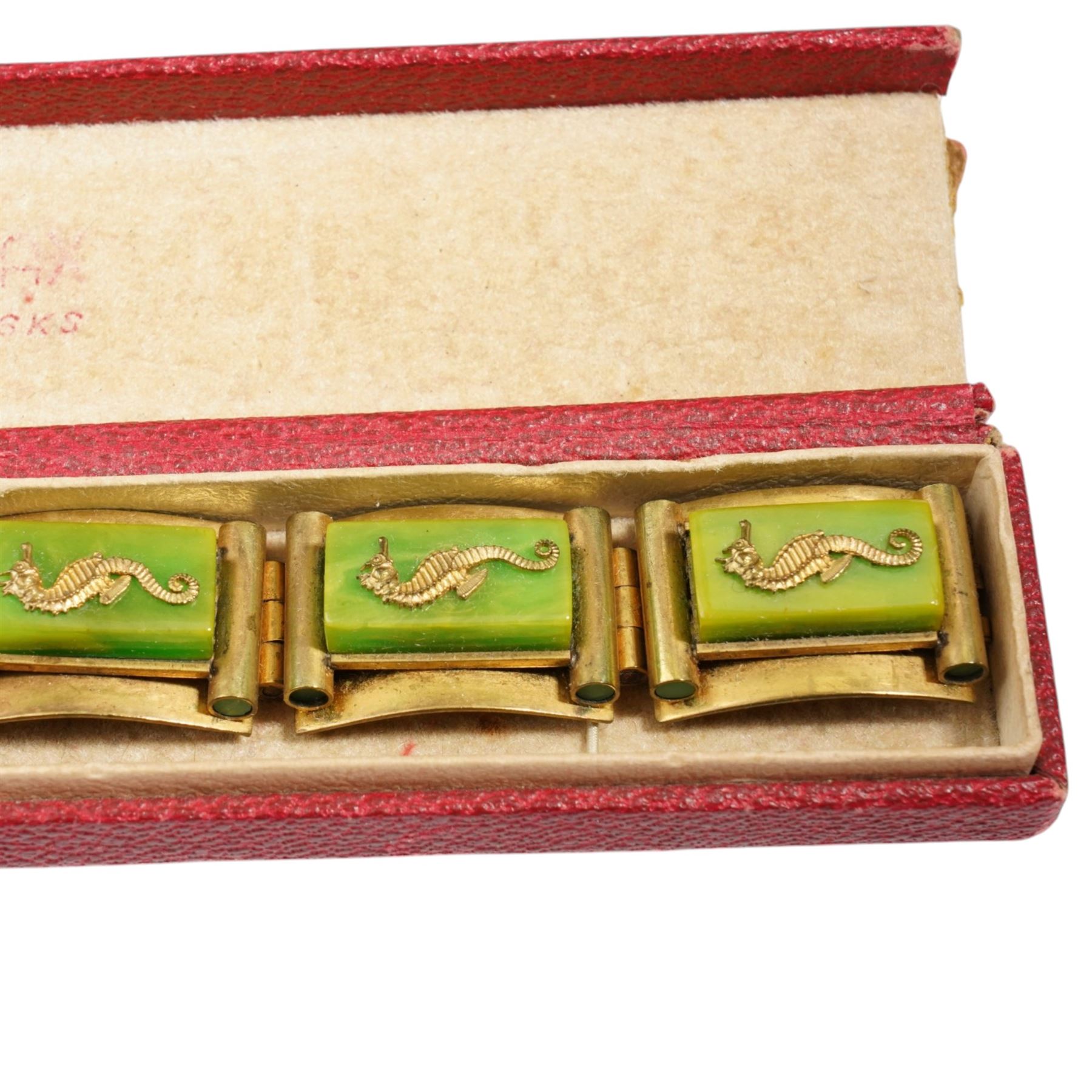 French Art Deco gilt metal and bakelite seahorse bracelet attributed to Jean Painleve, with matching clip