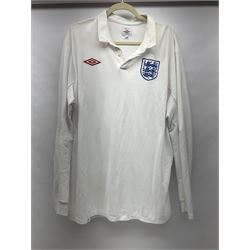 Fourteen items of replica sporting clothing including Leeds United football club shirts, England jerseys etc
