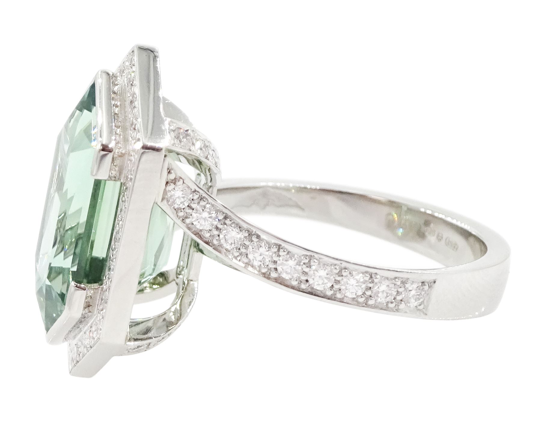 Platinum African Paraiba tourmaline and diamond ring by Scarab London, single fancy double bullet cut tourmaline of approx 8.37 carat, with round brilliant cut diamond surround and diamond set shoulders, London 2023, total diamond weight approx 1.05 carat, with Alan Poultney Gems report