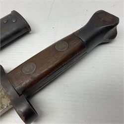 British Pattern 1888 knife bayonet, the 30.5cm double edged blade with raised central medial ridge; in leather covered scabbard L40.5cm overall