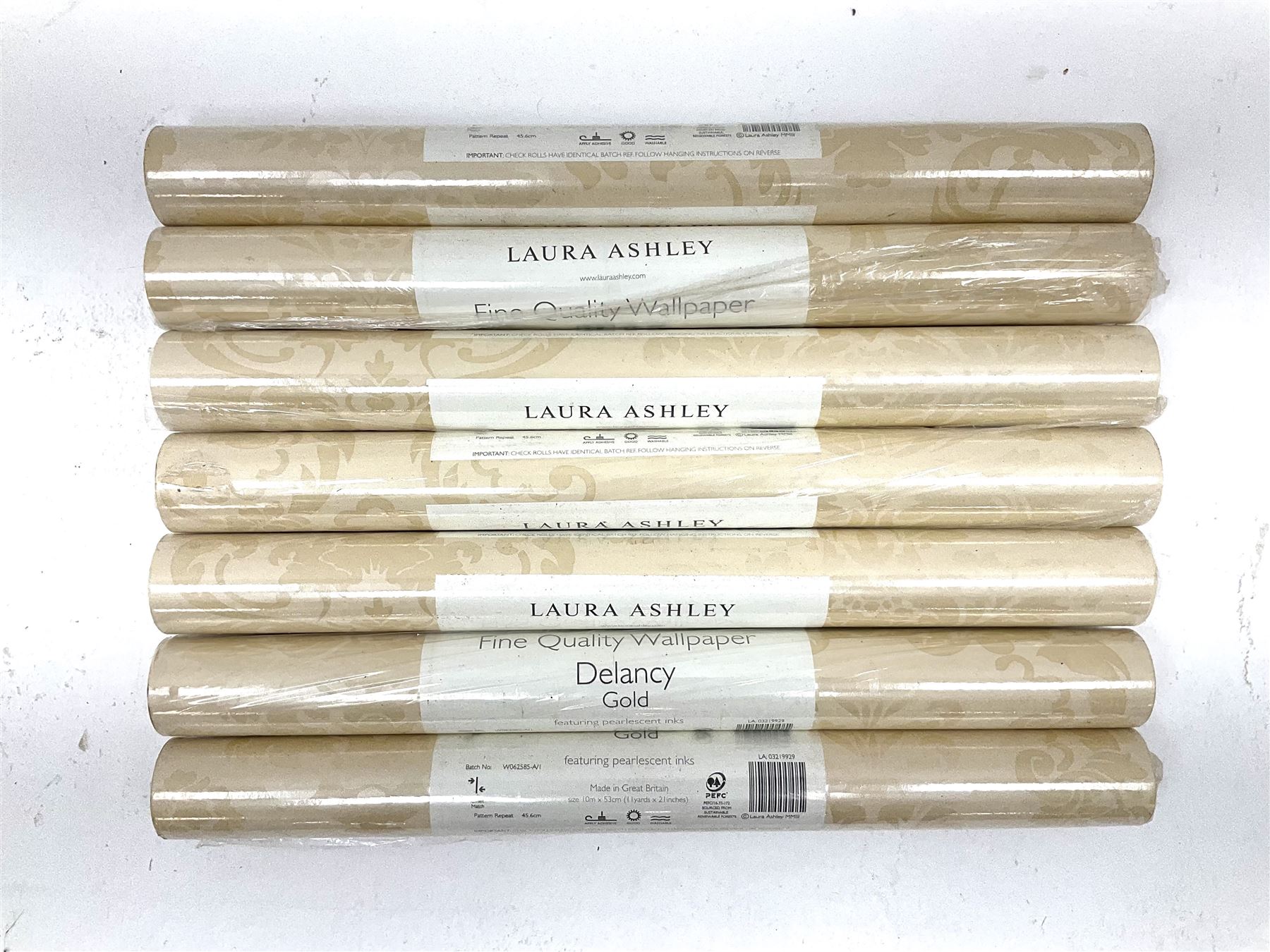 Seven rolls of Laura Ashley Delaney Gold wallpaper (W10m, W53cm)