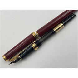 Montblanc Noblesse Oblige fountain pen, the maroon barrel and cap with gilt clip and mounts and nib stamped 585 14K/ct, together with a matching ballpoint pen, largest L14cm (2)
