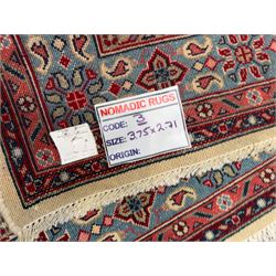 Northwestern Persian Hamadan carpet, hand-knotted, ivory field with an all-over Herati design of rosettes and serrated leaves within multiple borders, madder red with angular vine and rosette motifs, 375cm x 271cm 