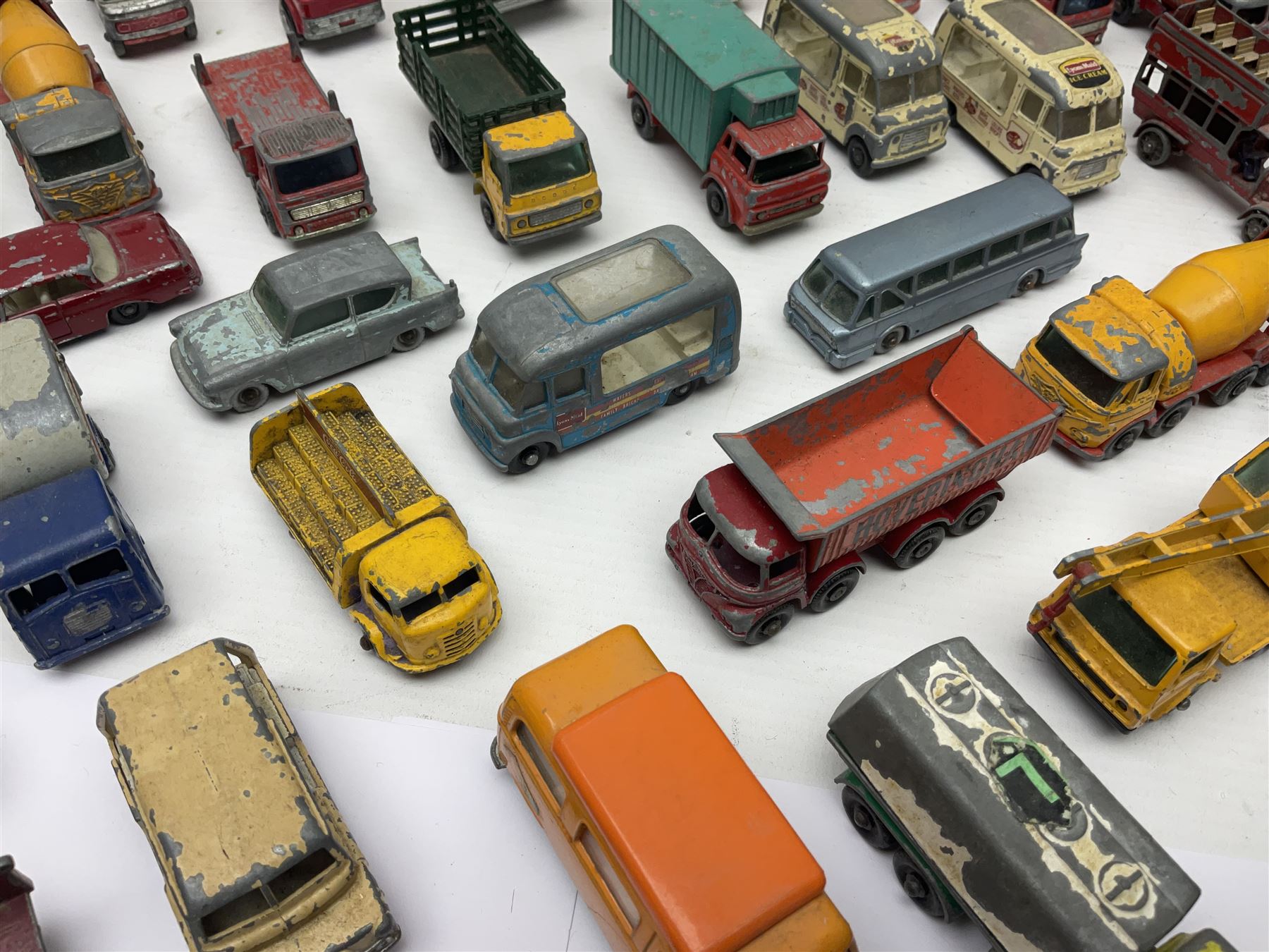 Lesney - approximately forty nine unboxed and playworn die-cast models of various scales with examples from the ‘Matchbox Series’ such as Mercedes Truck No.1, Mercedes Benz ‘Binz’ Ambulance No.2, Stake Truck No.4 etc; further models to include ‘Models of Yesteryear’ 1910 Benz Limousine Y-3, Bedford 7 1/2 Ton Tipper Van No.2, Ford Anglia No. 7 etc 