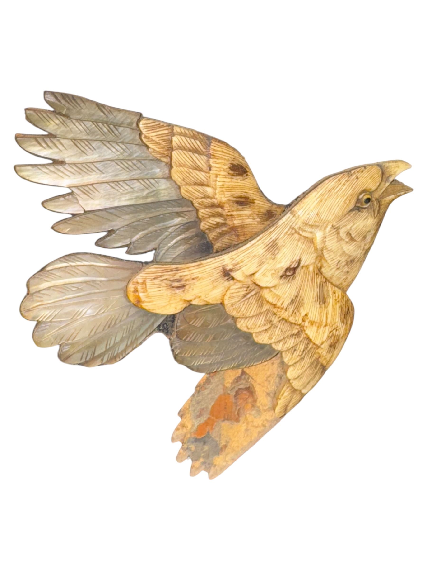 Meiji period (1868–1912), signed Shibayama carved hardwood lacquer panel inlaid with mother-of-pearl and ivory, decorated in high relief and inlaid, depicting two birds of prey with locked talons and beaks on leafy tree branch, signature in lower right corner, in original frame. This item has been registered for sale under section 10 of the APHA Ivory Act