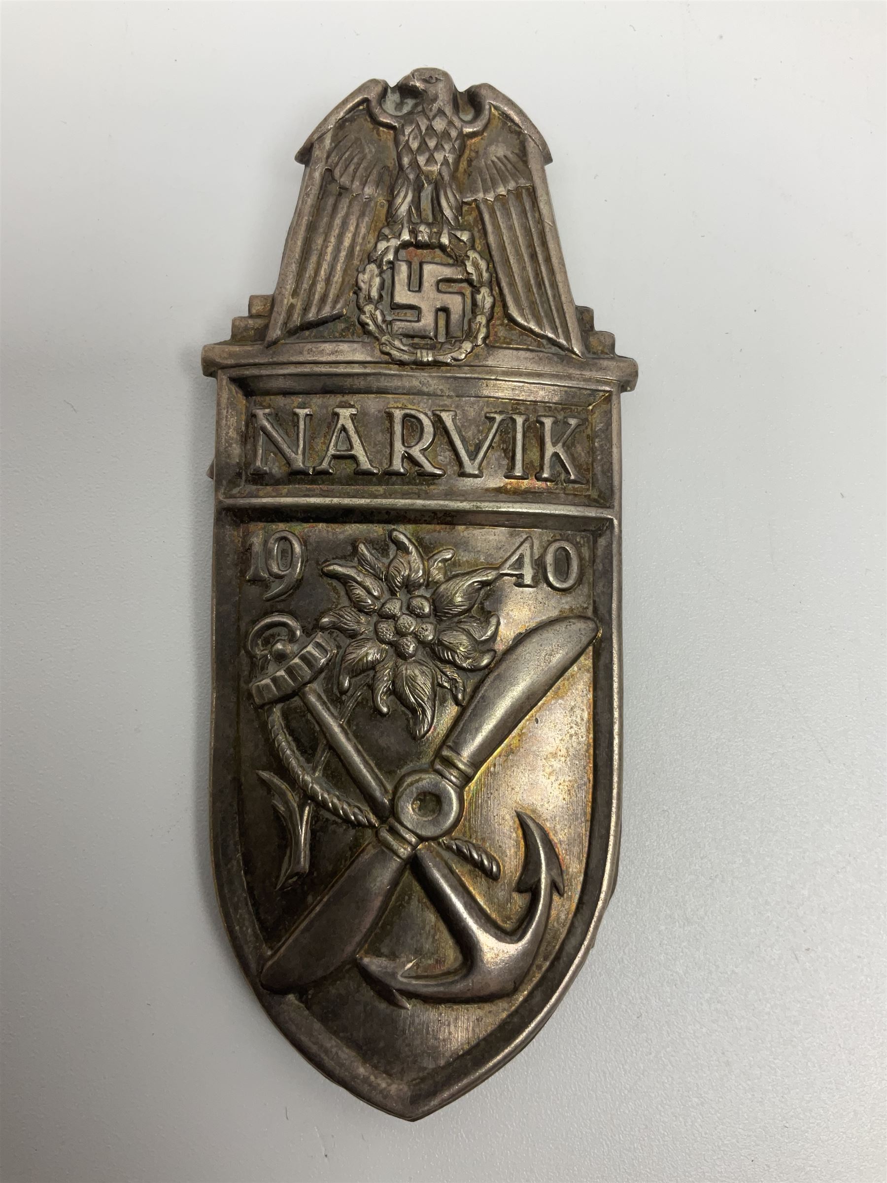Two German Arm-Shield badges - one Russian Front marked Demjansk 1942; the other marked Narvik 1940 (2)