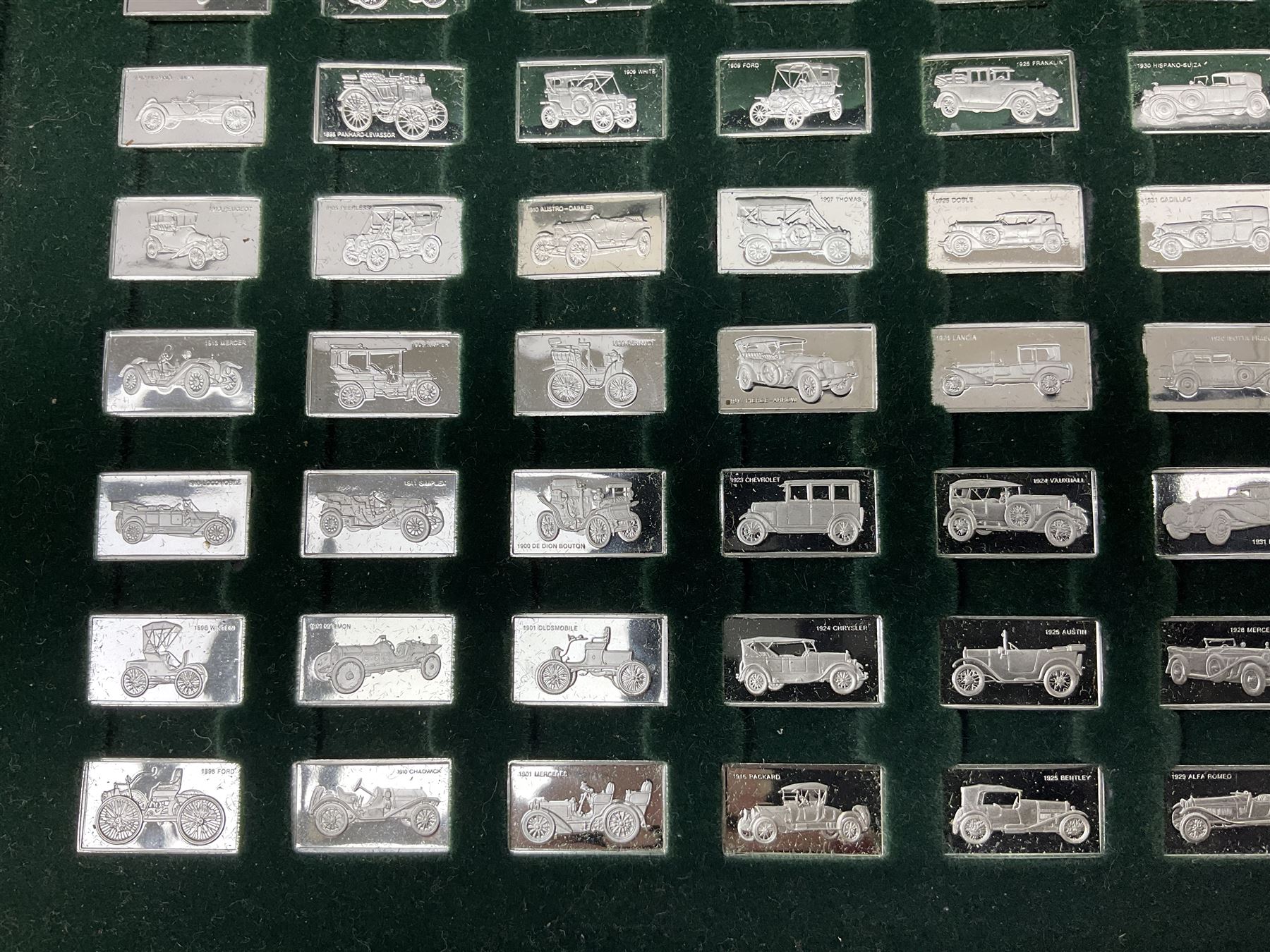 '100 Greatest Cars', set of one hundred silver miniature car ingots by John Pinchers, in presentation box 