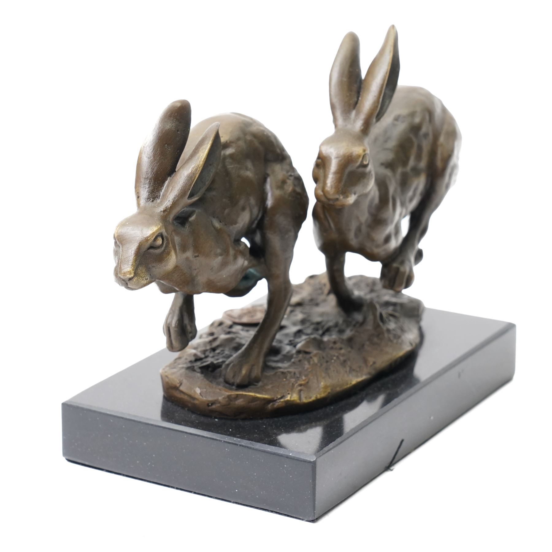 Bronze figure group, modelled as two hares in chase, after 'Nick', with foundry mark, upon a rectangular base, H11cm L15cm