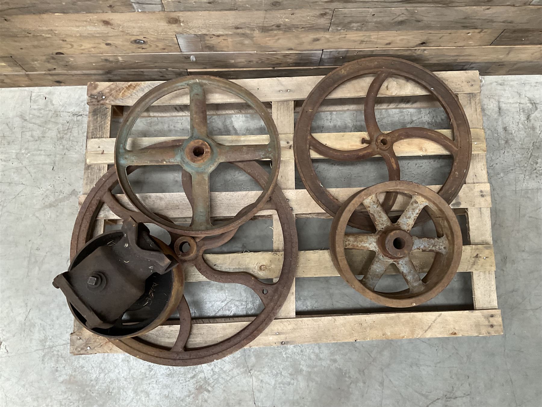 Various cast iron implement wheels