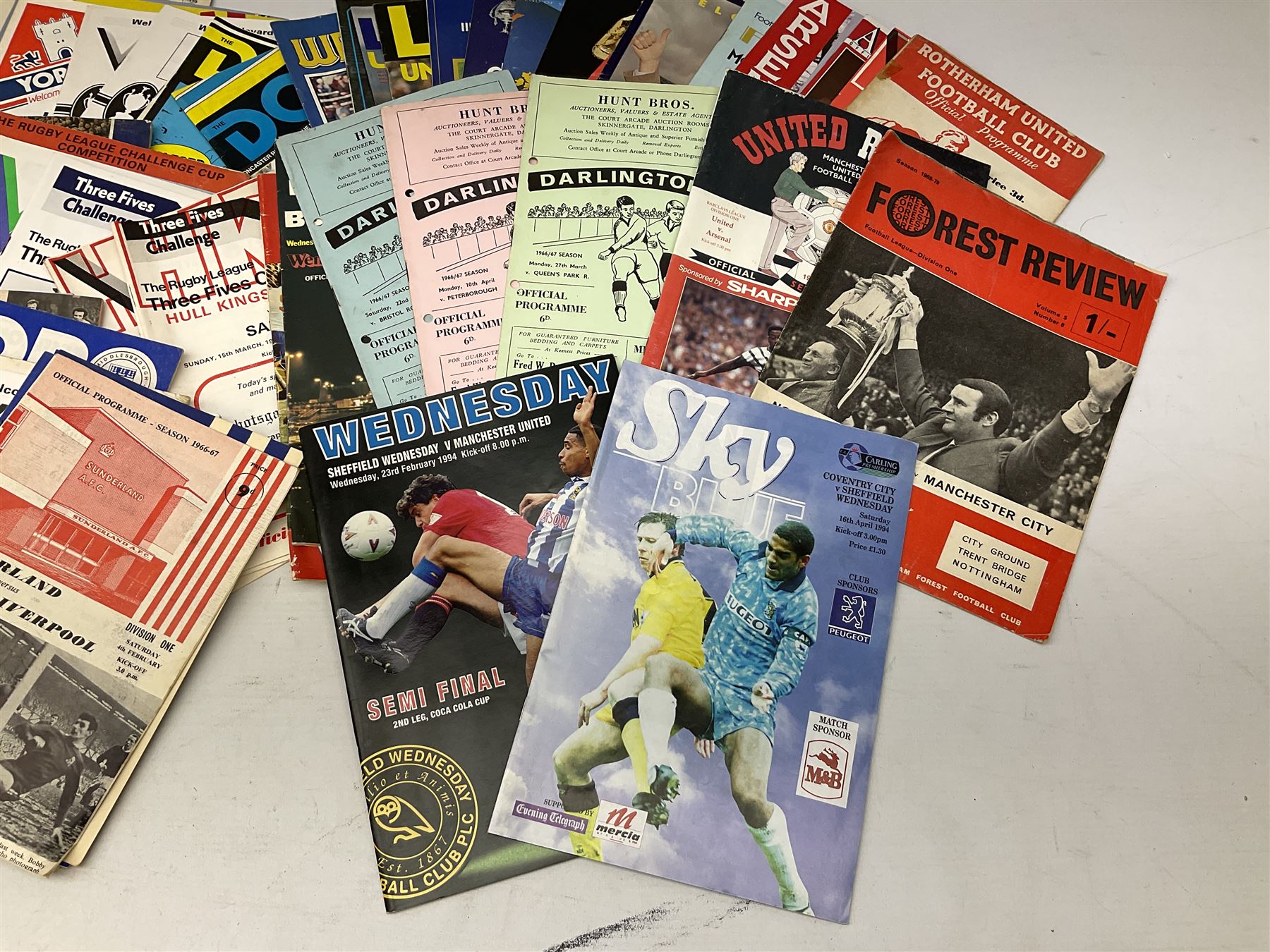 Quantity of football and rugby leave programs, to include Hull City 1949, Hull KR 1980's, Darlington FC 1960's, Liverpool 1960's, etc. 