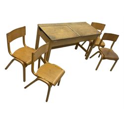 Mid-20th century beechwood school desk, rectangular lift-top desk with storage compartment, supported by square legs with cross stretchers; four matching beech chairs (5)