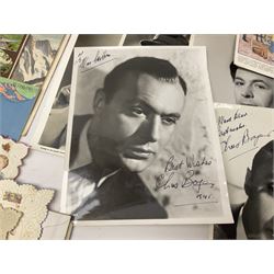 Early 20th century ephemera, to include signed photographs of Charles Boyer and Walter Pidgeon etc, a printed letter from Winston Churchill, two albums and a quantity of transfer books of Players and similar cigarette cards, including Boy Scout and Girl Guide Patrol Signs and Emblems and RAF Badges, a collection of greetings cards and postcards, a photograph album containing black and white photographs of Caius College Cambridge and guides and pamphlets on travelling Switzerland and the UK