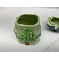 Collection of Japanese Maruhon ware novelty preserve pots, to include examples modelled as a windmill and cottages, together with other 1920s and 30s Art Deco style preserve pots, etc