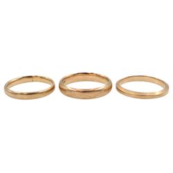 Three early 20th century 9ct rose gold wedding bands, all hallmarked