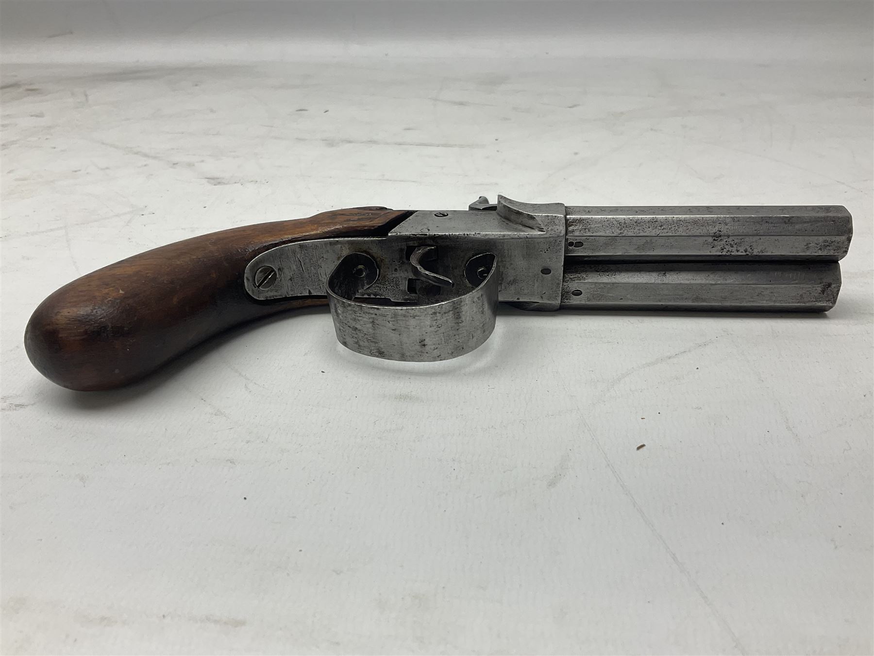 19th century Belgian double barrel side by side percussion pistol, approximately 40 calibre, with 8cm octagonal barrels, and wooden stock L22cm
