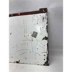 Enamel station sign for Charing Cross in red and blue on a white ground 56 x 71cm with hanging brackets