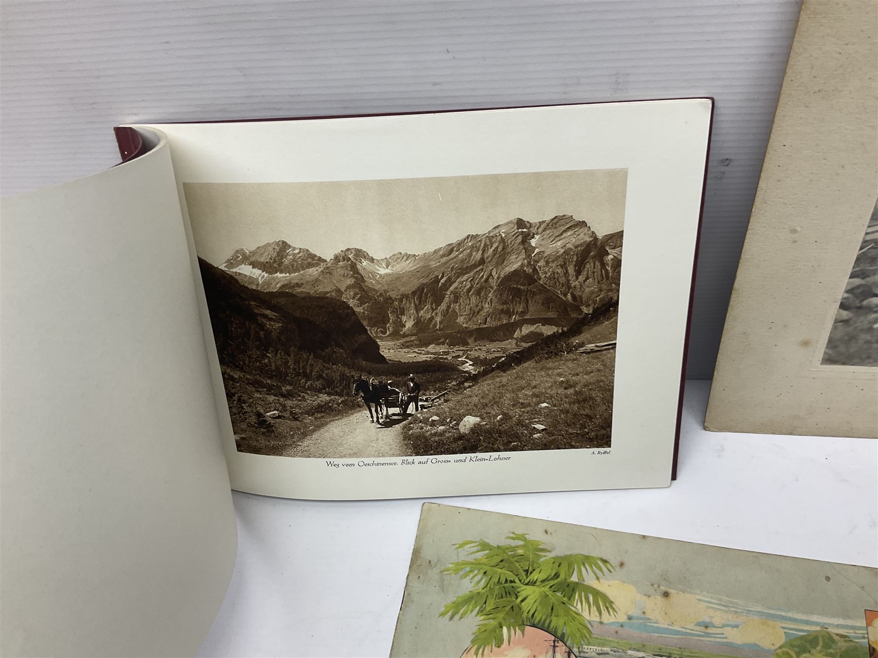 Two albums of cigarette cards, including Carreras Alice in Wonderland examples, together with vintage greetings cards, postcards, theatre stills, etc