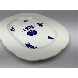 Three 19th century plates, comprising two circular examples and one oblong, each with osier moulded sides, the centres decorated in underglaze blue with Gillyflower type pattern, circular examples D25cm oblong example W27cm