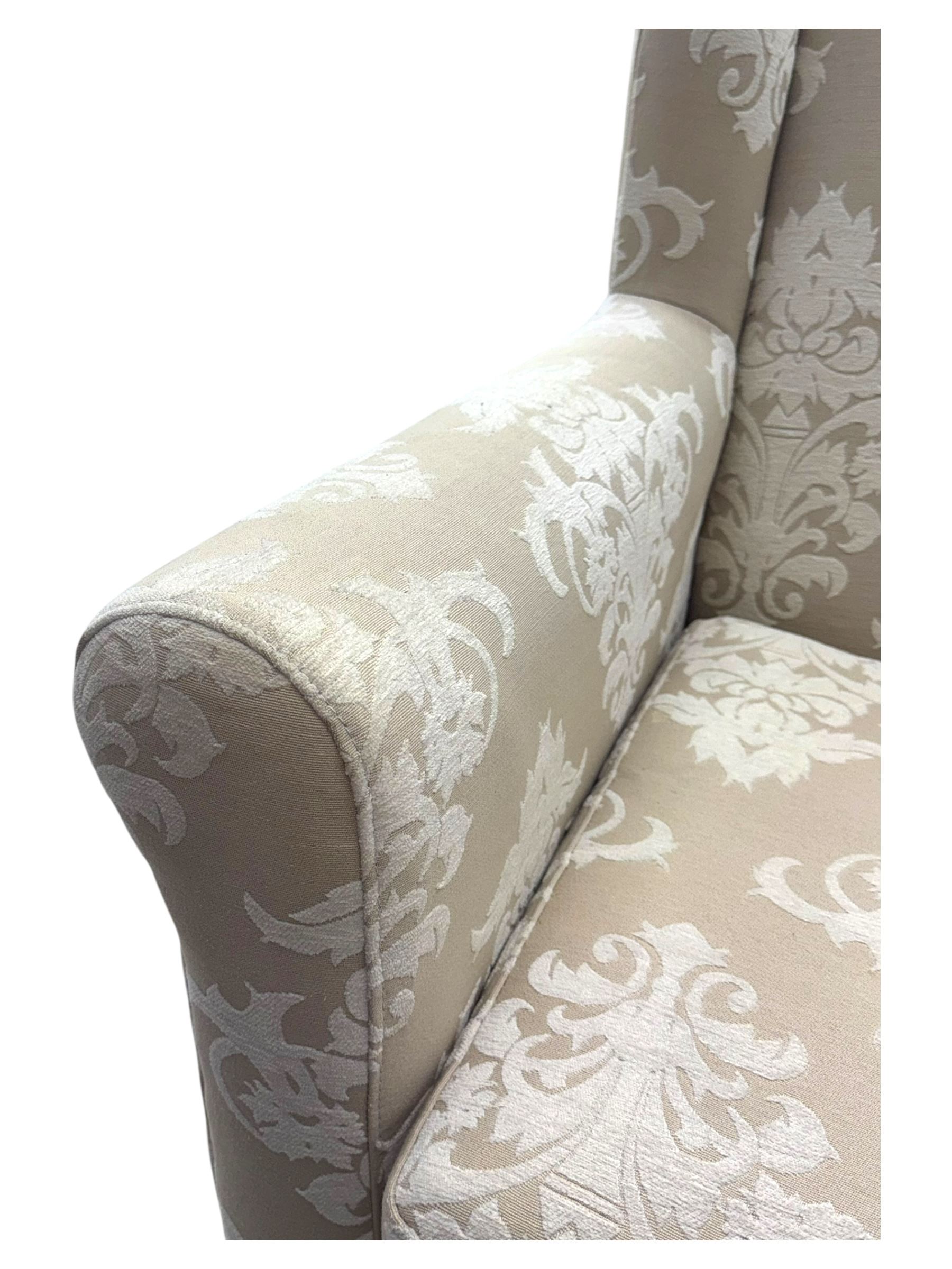 Chatsworth hardwood-framed armchair upholstered in cream  damask, with rolled arms and cushioned seat, raised on square tapered feet