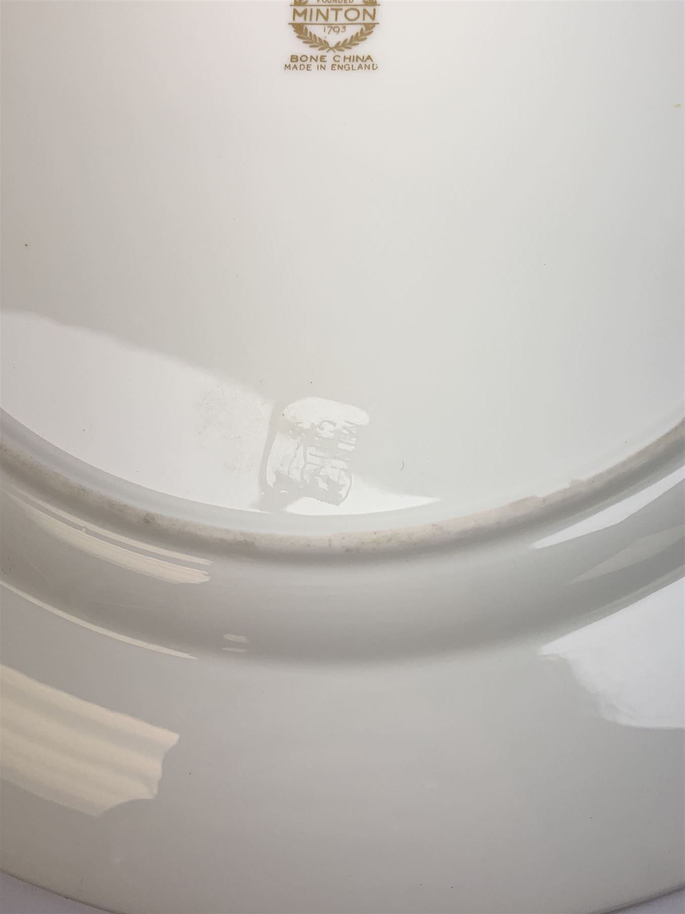 Large Minton cabinet plate, with central hand painted panel of Windsor Castle, signed A Holland, within a tooled gilt turquoise border, with impressed and printed marks and inscribed Windsor Castle beneath, D32cm