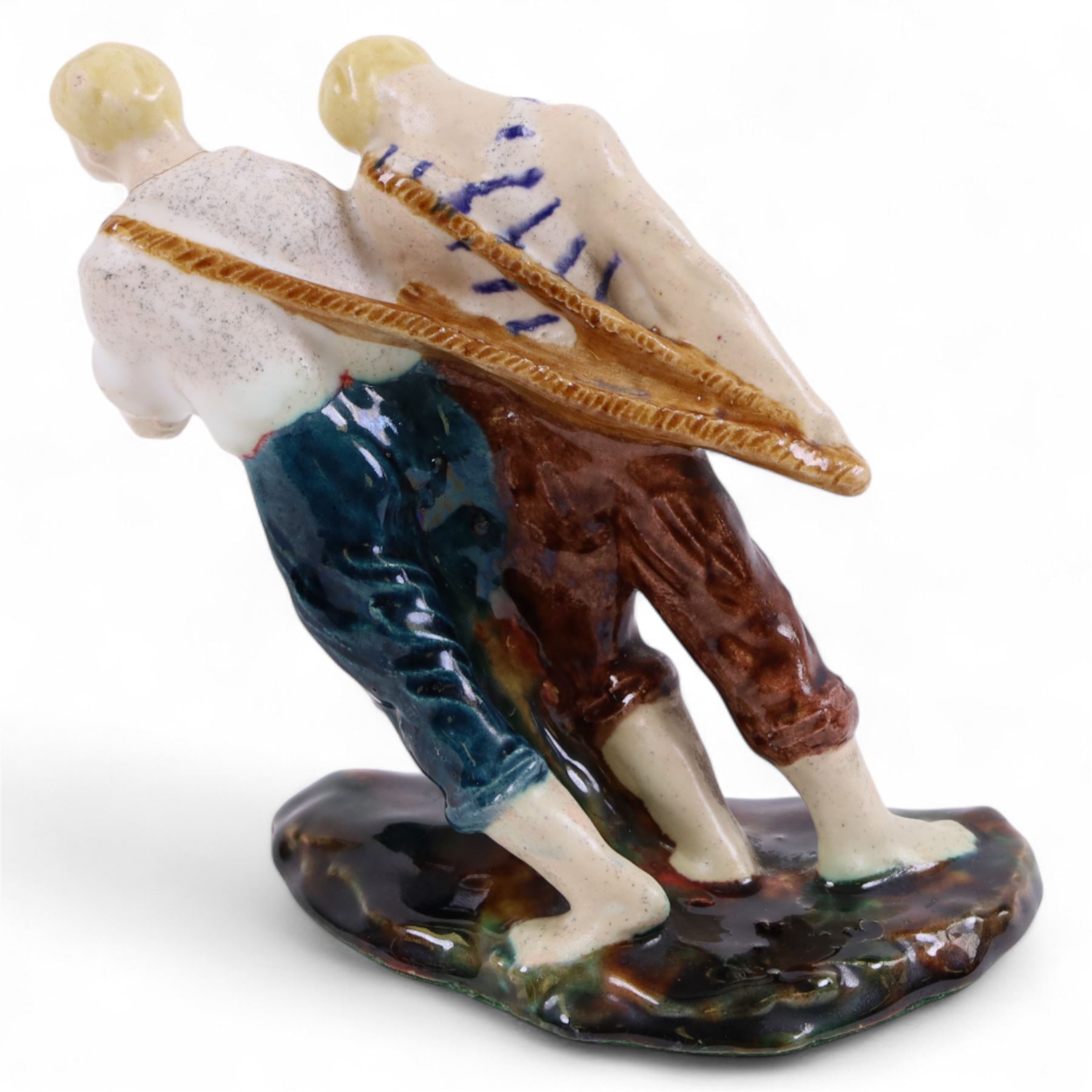 Guero figure group, modelled as two men, H14cm