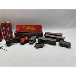 Trix Twin Railway - Hunt Class 4-4-0 locomotive and tender 'Pytchley' No.62750, boxed; 0-4-0 tank locomotive with plastic body No.67611; three passenger coaches (one boxed); six goods wagons; three boxed Yard Lamps etc; and Tri-ang Track Cleaning Car, boxed