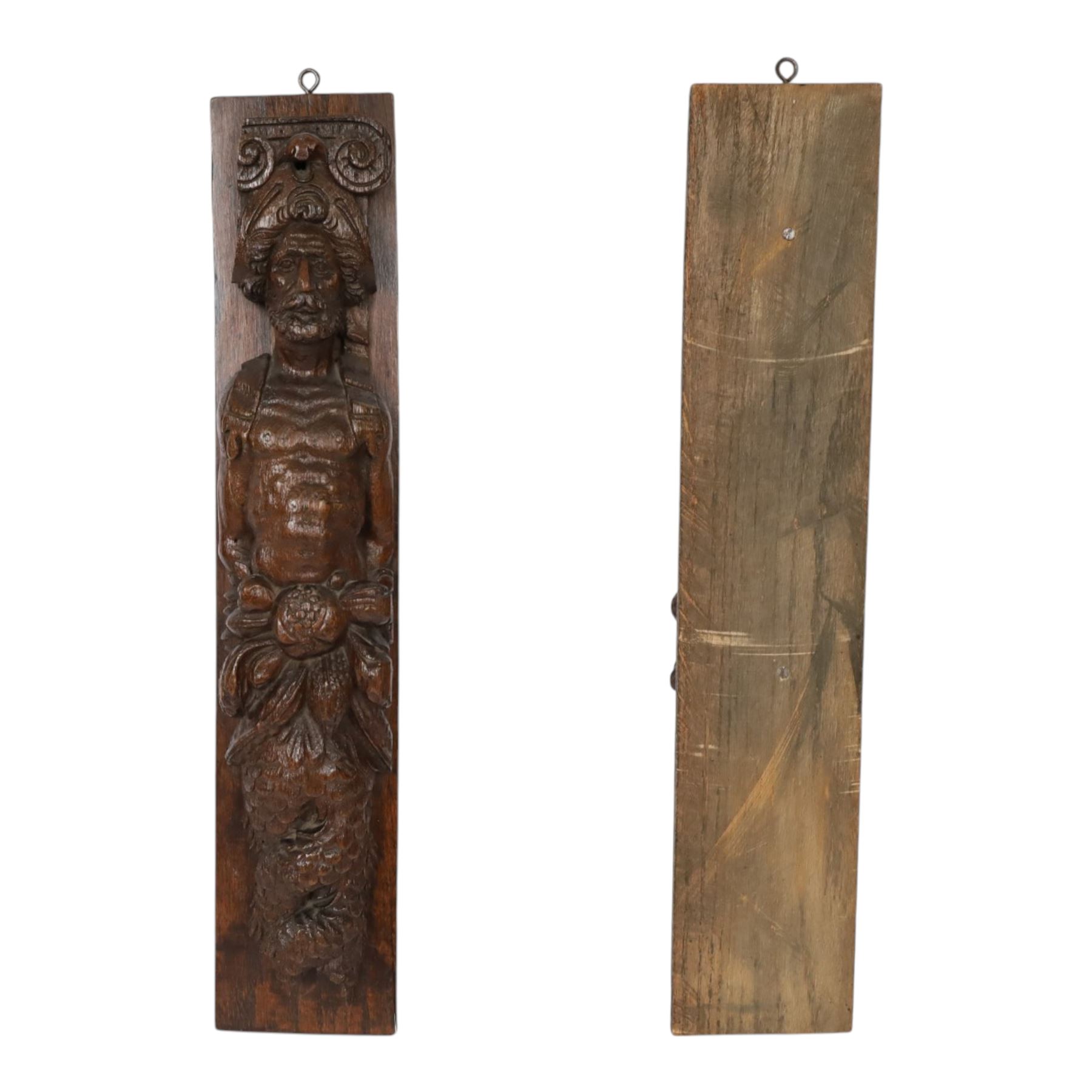 Pair of 17th century carved oak terms, each depicting a male figure in headpiece, with fish tail beneath fruits, 51.5cm