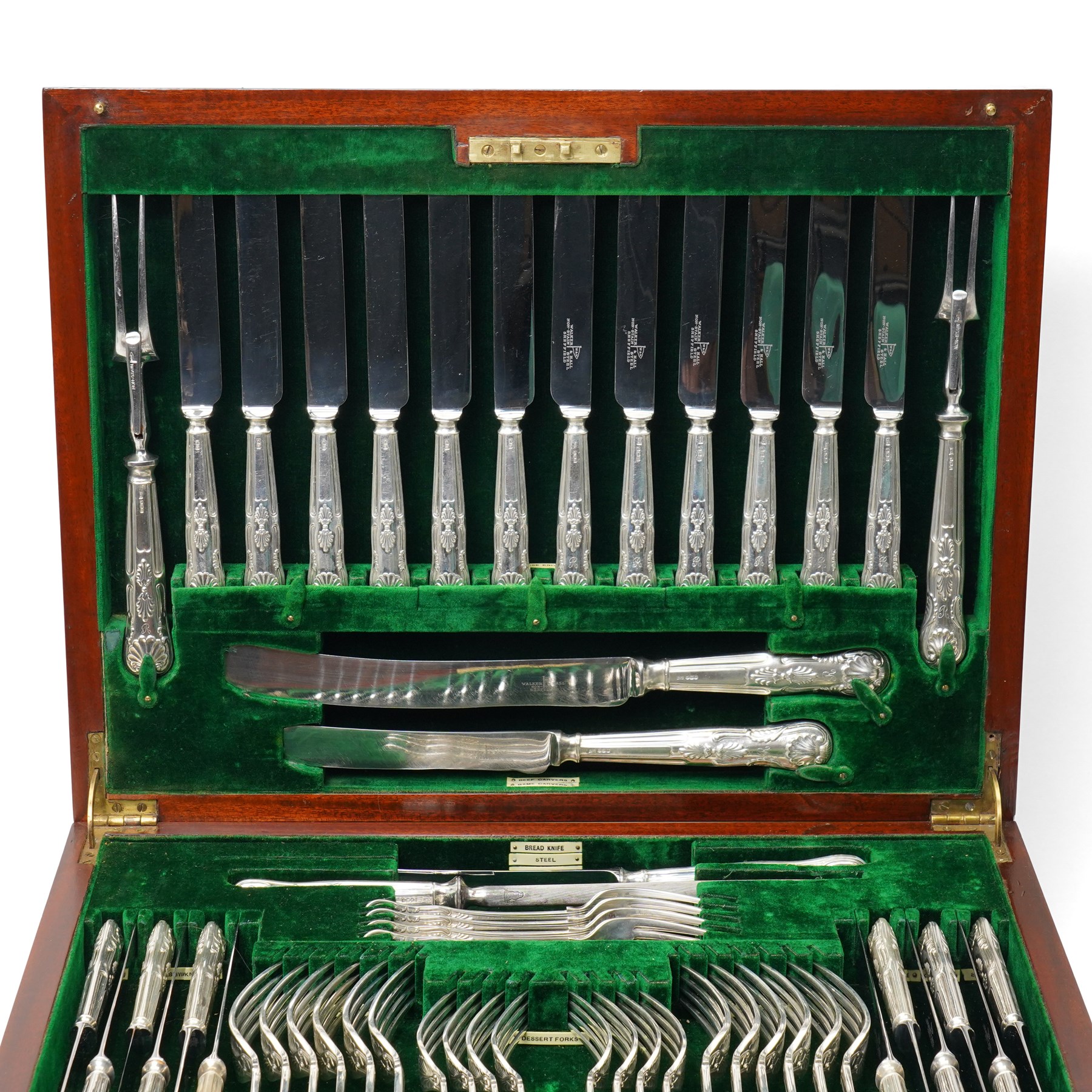 Extensive canteen of silver Kings Pattern cutlery for twelve covers comprising silver handled table and dessert knives, table and dessert forks, fish knives, forks and servers, dessert spoons, soup spoons and table spoons, sauce and soup ladles, salad servers, carving knives and forks etc 134 pieces in mahogany case with countersunk brass handles W49cm Sheffield 1928 Maker Walker & Hall 