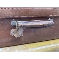 Vintage leather traveling case with monogram to cover, with watered silk lining to interior, and some contents, plus a further vintage travel case, (2)