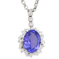 18ct white gold oval tanzanite, round brilliant and marquise cut diamond pendant, stamped 750, on 14ct white gold necklace, stamped 585, tanzanite approx 10.30 carat, total diamond weight approx 1.40 carat