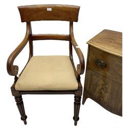 Early 19th century mahogany armchair, scrolled arm terminals over drop in upholstered seat and reeded supports (W52cm H93cm); with another similar; and a 19th century mahogany converted commode (W64cm H71cm)