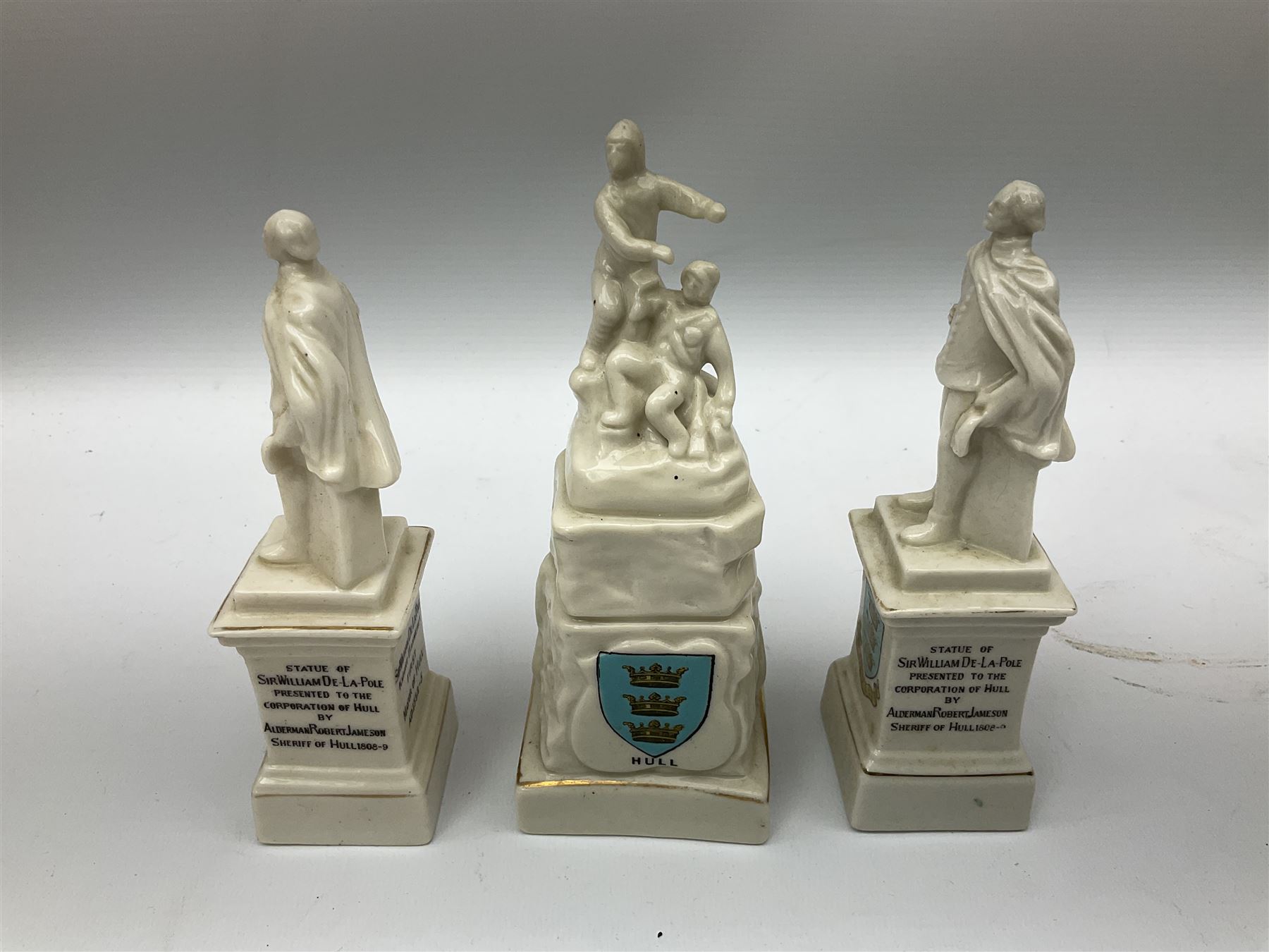 Fourteen items of Hull crested china by W.H. Goss etc including  Boer War, De La Pole and Wilberforce monuments, 3-piece cruet on trefoil stand, various vases and jugs etc  