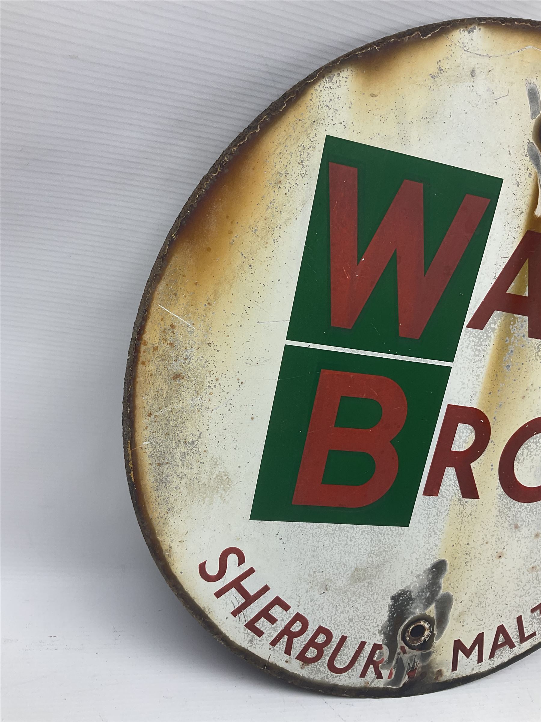 Ward Bros Sherburn Malton enamel sign, together with a Scarborough Hotels Association enamel sign, Malton sign D46cm 