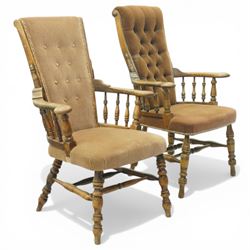 Near pair of late 20th century oak high back armchair, upholstered in brown fabric with buttoned back and close-nailed borders, shaped arms on turned supports, over a stuff-over seat, raised on turned legs united by stretchers