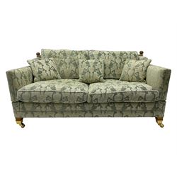 Three-piece hardwood-framed lounge suite - large two-seat Knole sofa with drop ends, upholstered in patterned fabric decorated with urns and foliage (W190cm, D117cm, H88cm); armchair upholstered in contrasting geometric pattern fabric (W83cm, D102cm, H93cm); and another armchair (W82cm, D102cm, H92cm) (3)