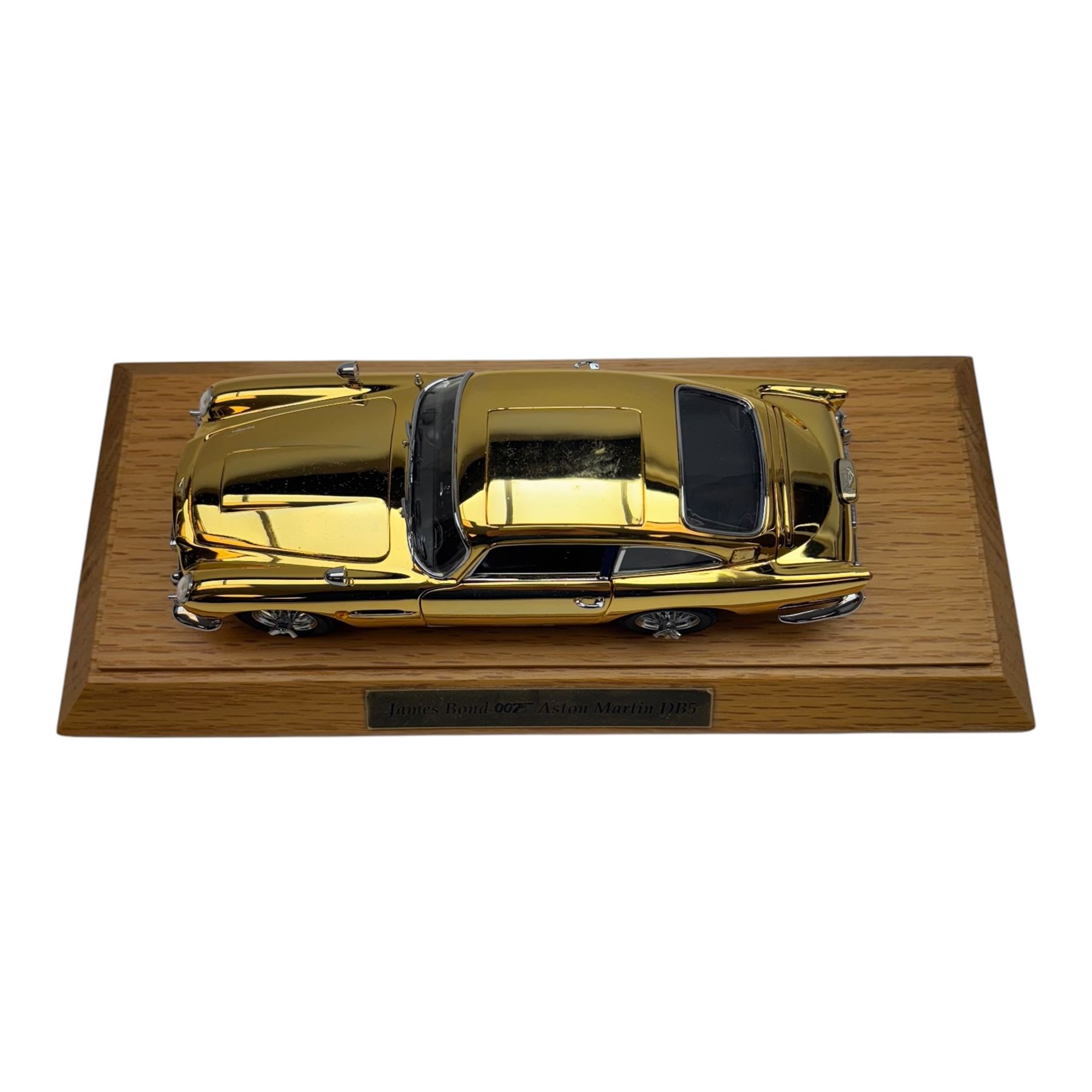 Danbury Mint Special Edition James Bond 007 22 carat gold plated 1:24 scale Aston Martin DB5, authentic replica of the car driven in Goldfinger and Thunderball, with certificate of authenticity, display case and original box