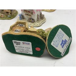 Eighteen Lilliput Lanes, including The Penny Farthing, The Pigsty, Borrowdale School, Fairy Cake Tearoom, An Apple a Day,Ladybird Cottage etc, all with original boxes 