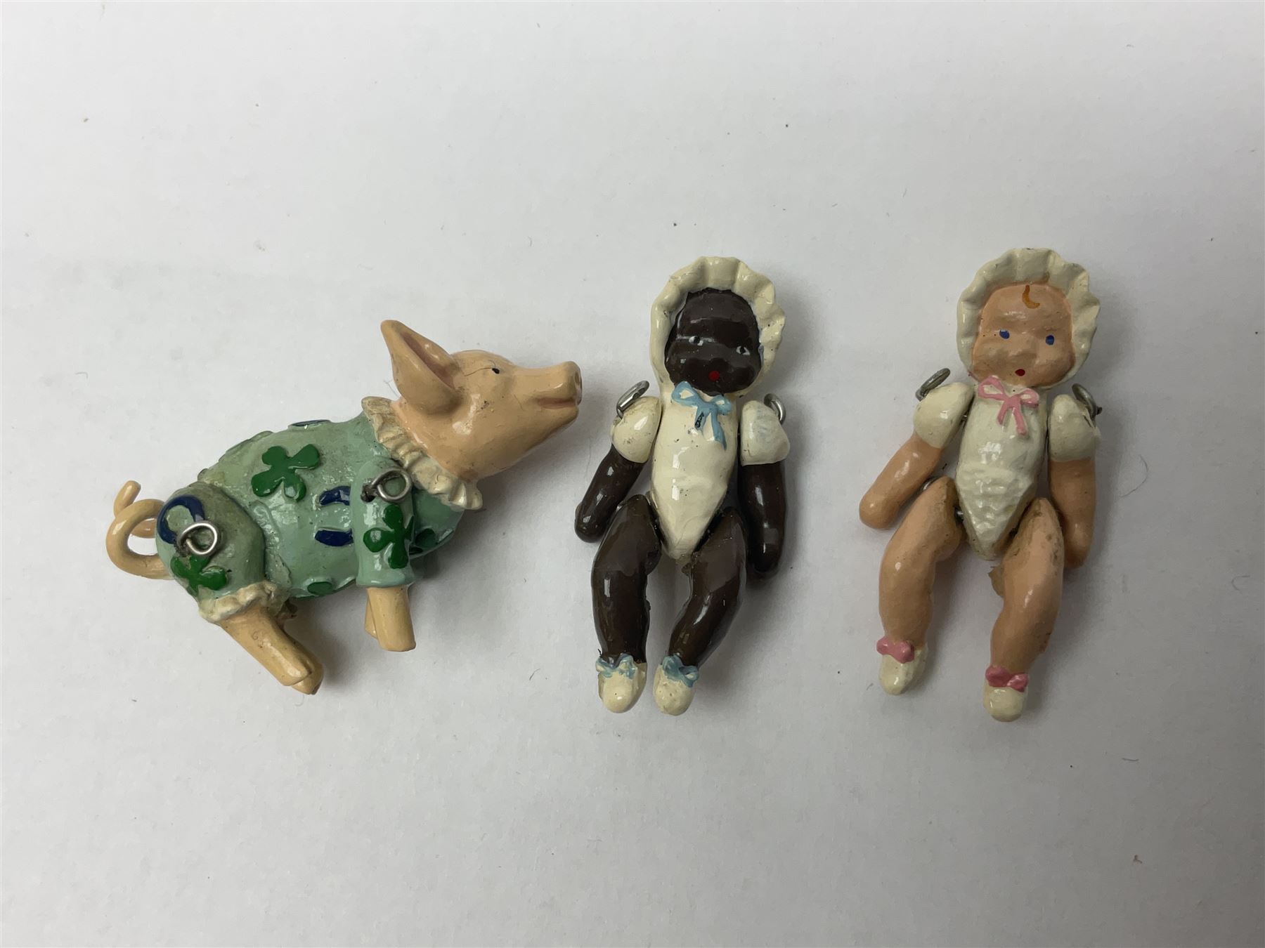 Six Hantel miniature articulated pewter figures, including Father Christmas, Drummer, pig etc 