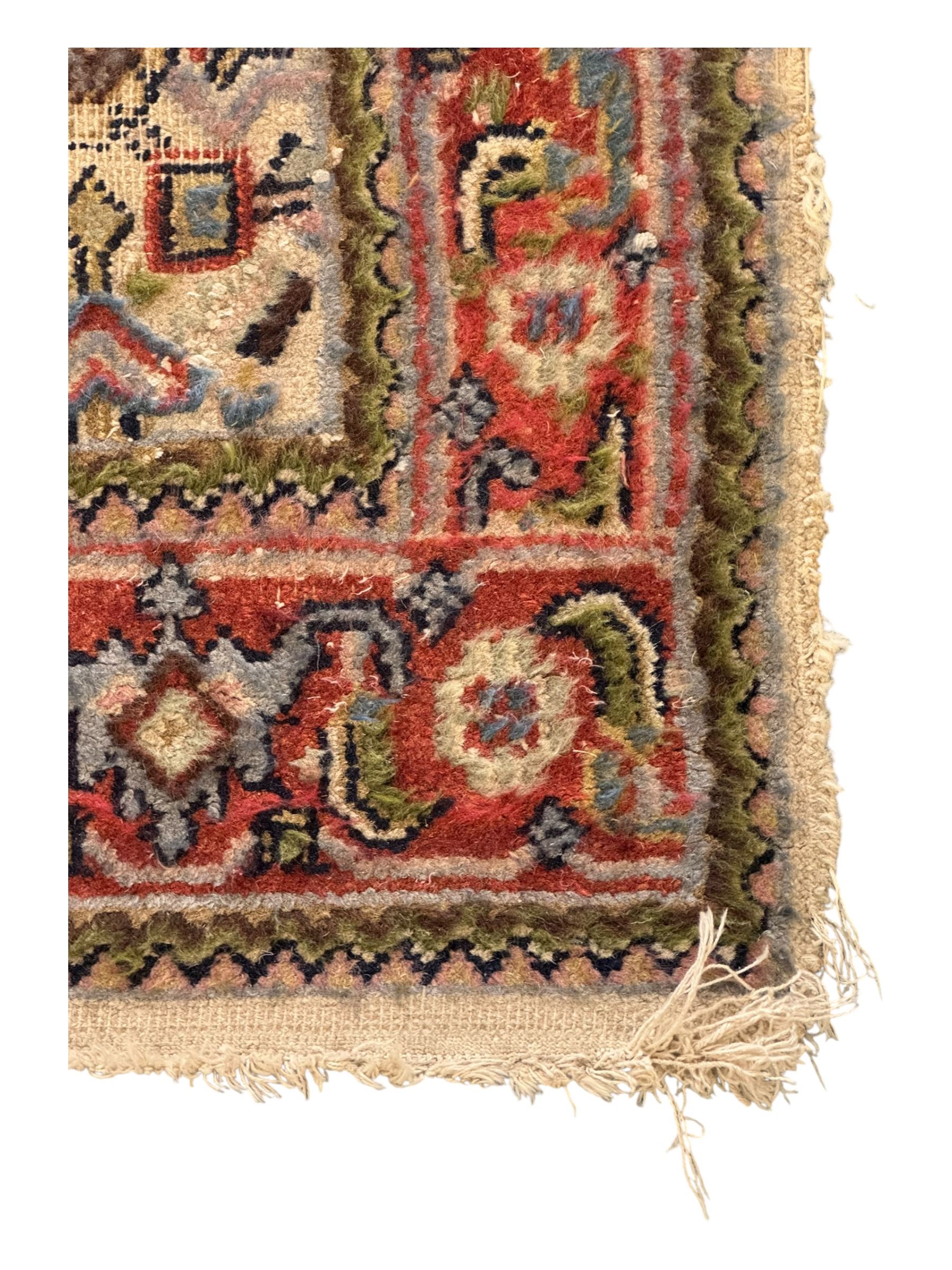 Persian-style wool rug, cream field with floral and geometric motifs, wide floral border (74cm x 142cm); Persian wool rug, beige field with dense floral patterns, narrow floral border (70cm x 144cm); Tribal wool rug, red and navy with diamond motifs (96cm x 60cm); Persian pictorial wool rug, black field with vase, birds, and floral border (70cm x 73cm)