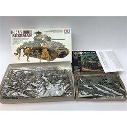 Seven plastic model construction kits - Airfix Vodaphone McLaren Mercedes racing car and Jaguar 'E' Type, Revell Ferrari F310B racing car and four tanks by Airfix, Revell and Tamiya; all boxed in factory sealed transparent packaging; together with an Airfix Spitfire kit tin, various model instruction sheets, catalogues and magazines.