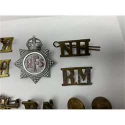 Two Services Rendered badges Nos.B23060 and B201341; two MSO BAOR (Mixed Services Organisation British Army of the Rhine) badges; small quantity of shoulder titles, lapel/sweetheart brooches, buttons and non-military related items