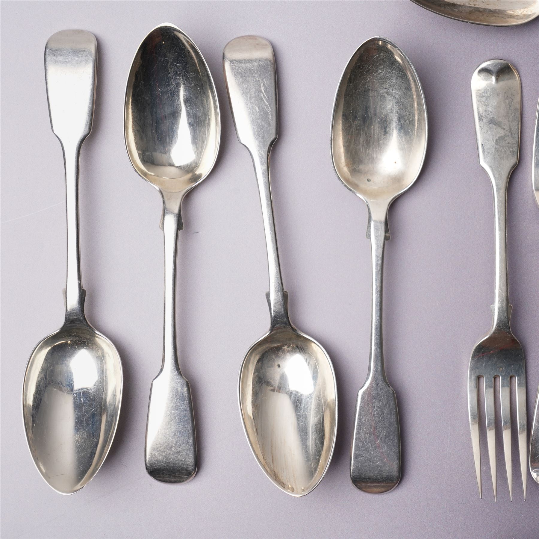Suite of Victorian silver fiddle pattern cutlery comprising eighteen table forks, seventeen dessert spoons, fifteen dessert forks and three table spoons London 1856 Maker A B Savory & Sons