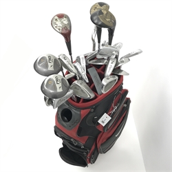  A quantity of golf clubs and irons with a Nike bag  