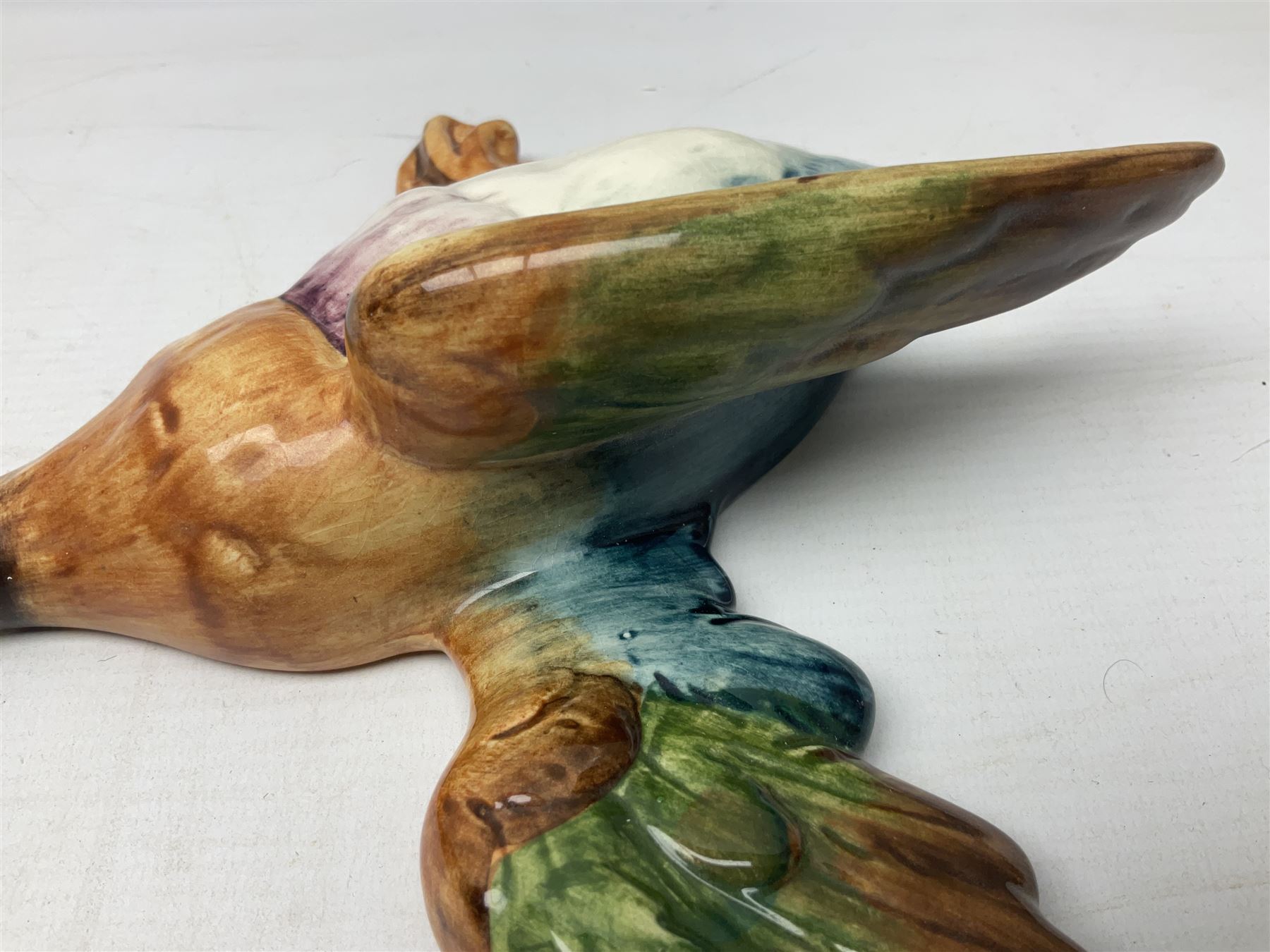 Set of five Beswick graduated wall mounting figures of flying ducks, models from 596/0 to 596/4, largest L29cm