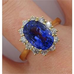 18ct gold fine Ceylon sapphire and diamond cluster ring, hallmarked, sapphire approx 3.85 carat, total diamond weight approx 0.50 carat