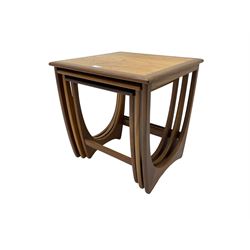 G-Plan - 'Astro' mid-20th century teak nest of three tables, square top over curved u-shape supports united by stretcher
