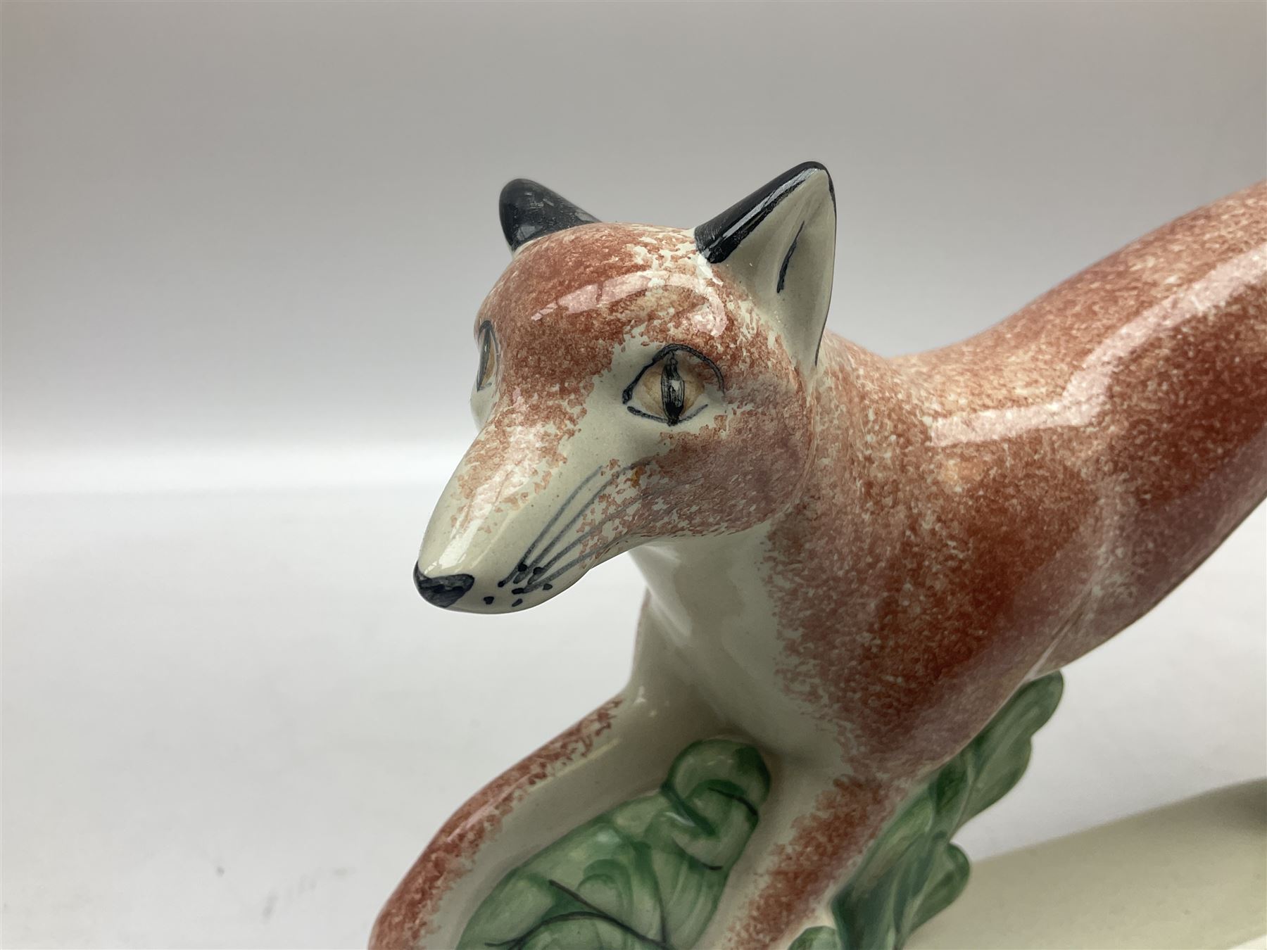 Six Rye Pottery figures, comprising, jumping fox, squirrel upon a branch, billy goat, bull, chicken and cockerel  